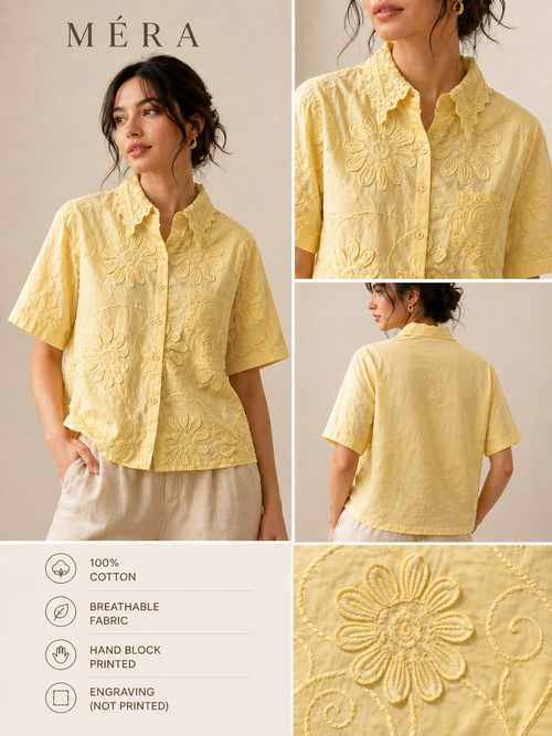 Yellow embroidered shirt with detailed design, worn by a model, on a beige background.